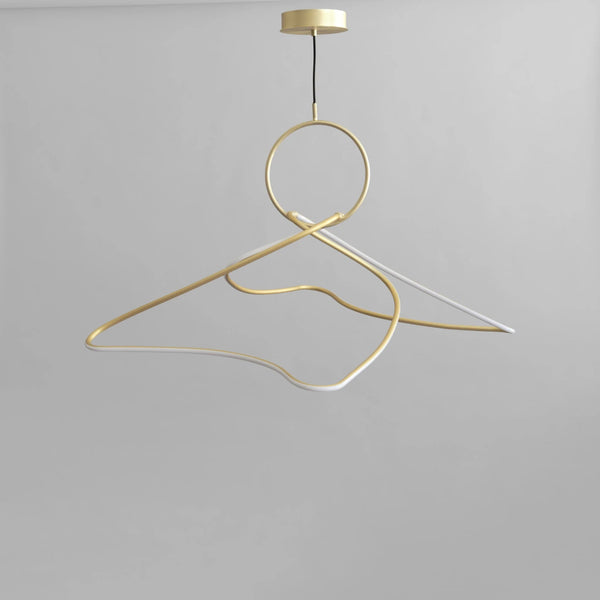 Gold hanger pendant light on a gray background from 101 Copenhagen available at Spacio retail stores in Mumbai & Kolkata. 