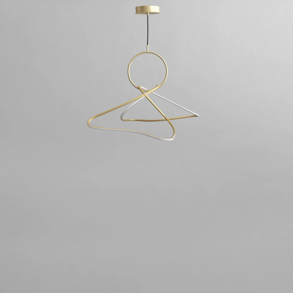Brass chandelier on a gray background from 101 Copenhagen available at Spacio retail stores in Mumbai & Kolkata. 