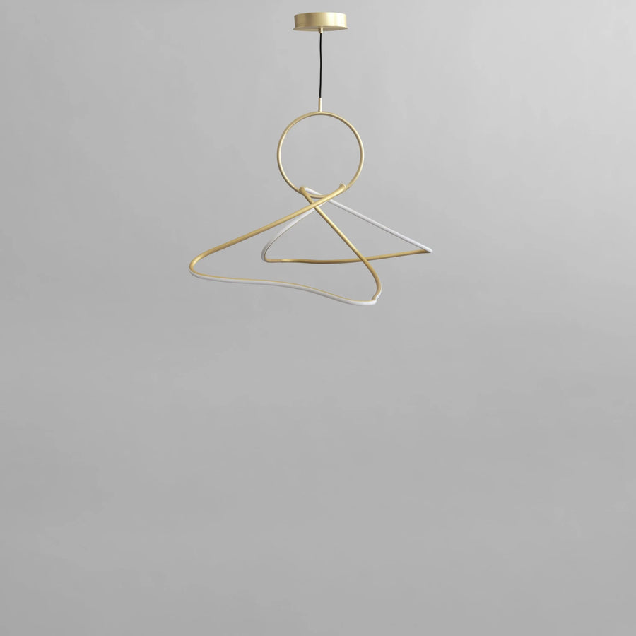 Brass chandelier on a gray background from 101 Copenhagen available at Spacio retail stores in Mumbai & Kolkata. 