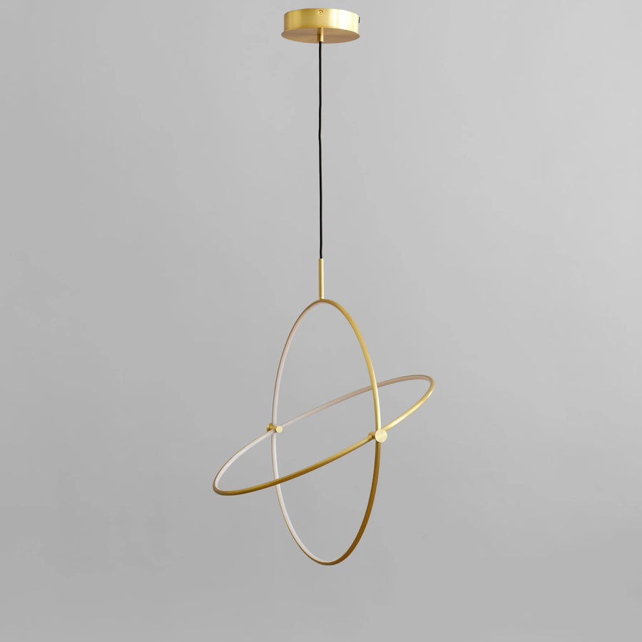 Modern pendant light with brass and black design on a gray background from 101 Copenhagen available at Spacio retail stores in Mumbai & Kolkata. 