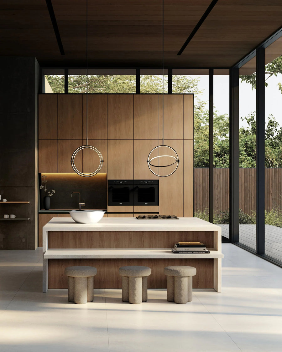 Modern kitchen with wooden cabinets and a large island.