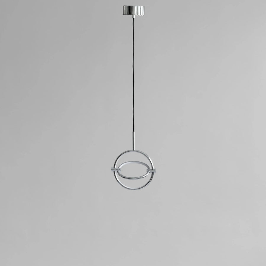 Modern pendant light with circular design on a gray background