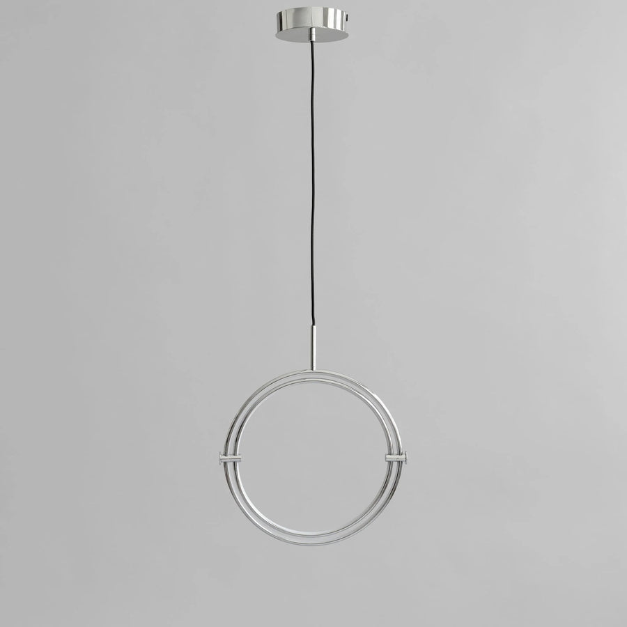 Modern pendant light with circular design on a gray background