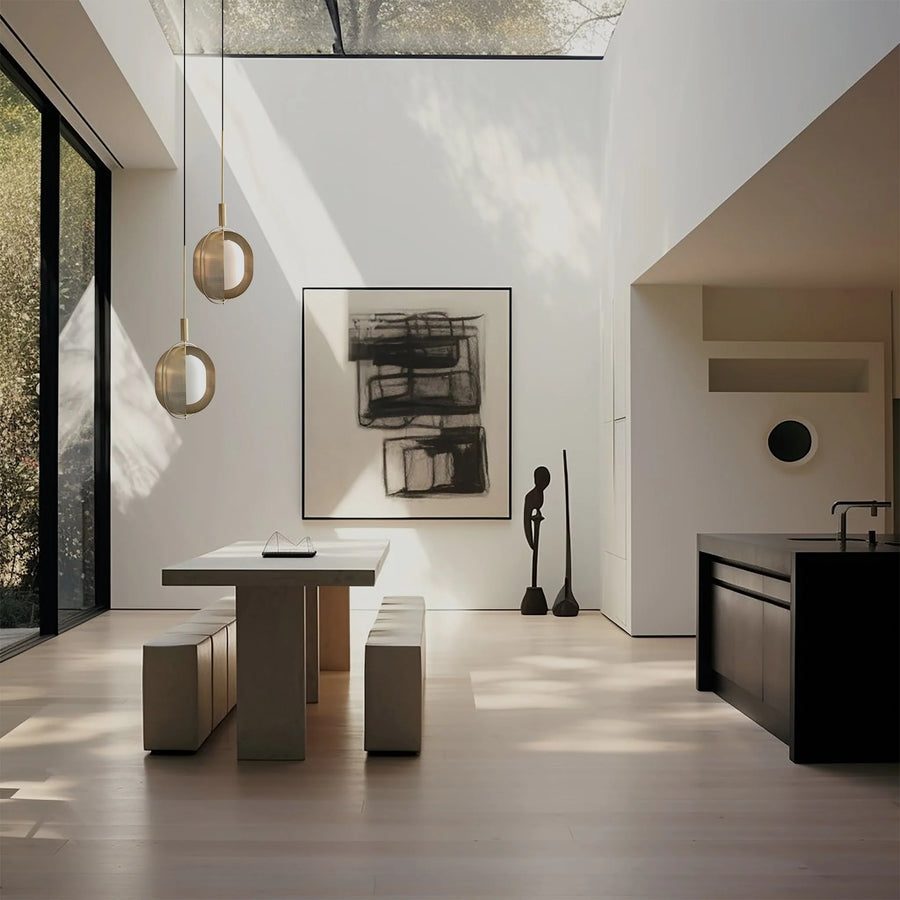 Modern Japandi theme kitchen with a dining table, pendant lights, and artwork on the wall.