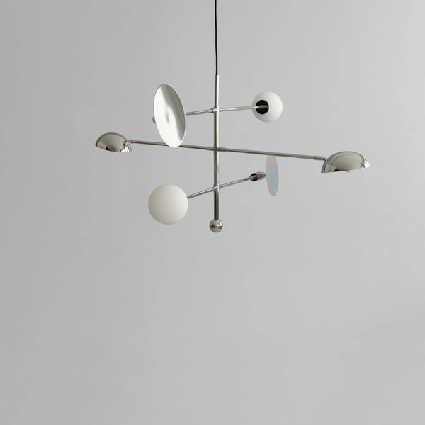 Modern chandelier with white spherical lights on a gray background from 101 Copenhagen available at Spacio retail stores in Mumbai & Kolkata. 