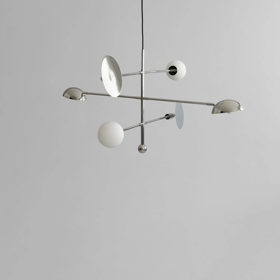 Modern chandelier with white spherical lights on a gray background from 101 Copenhagen available at Spacio retail stores in Mumbai & Kolkata. 