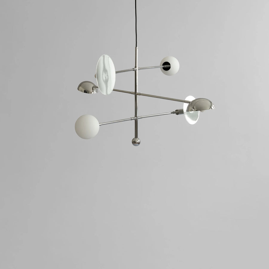 Modern chandelier with spherical lights on a gray background