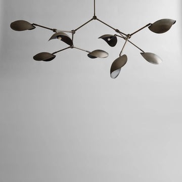 Modern chandelier with leaf-like design on a plain background in bronze finish from 101 Copenhagen available at Spacio retail stores in Mumbai & Kolkata. 