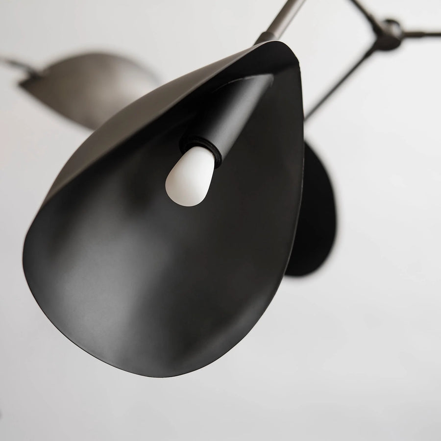 Modern black pendant light on a white background