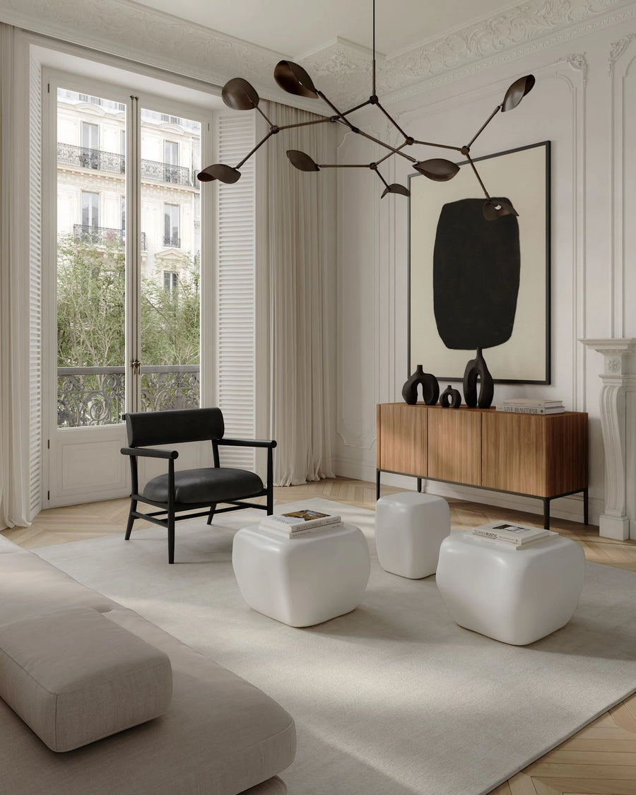 Modern living room with minimal furniture and decor.