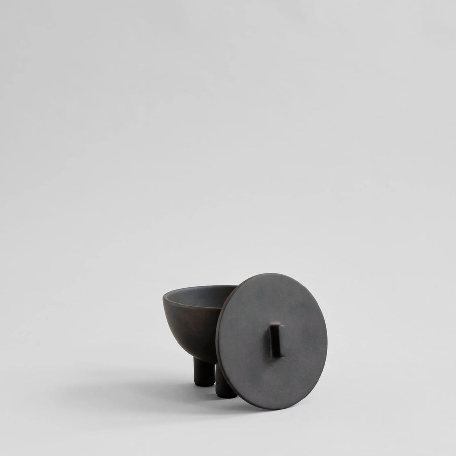 Coffee Colour ceramic bowl and lid on a light gray background from 101 Copenhagen at Spacio retail stores in Mumbai & Kolkata. 