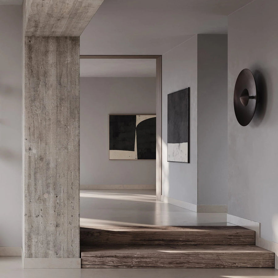 Dusk Wall Light Burned Black by 101 Copenhagen in a minimal Scandinavian theme interior available at Spacio retail stores in Mumbai & Kolkata. 