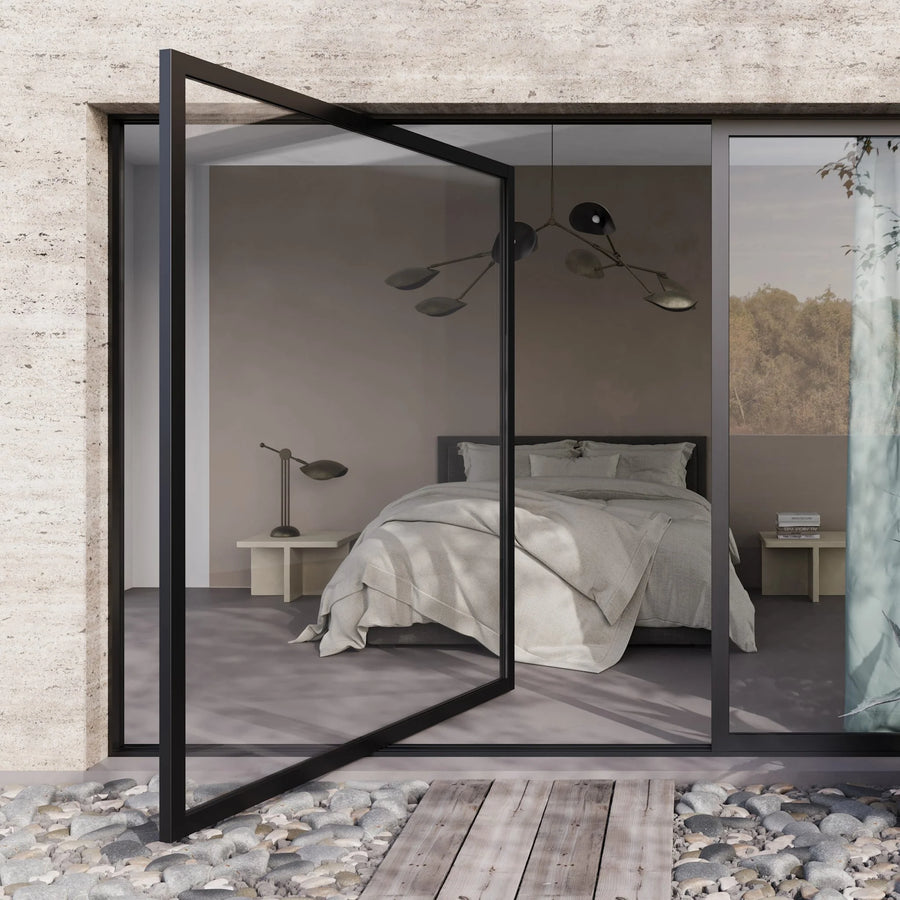 Modern bedroom with glass partition and natural light