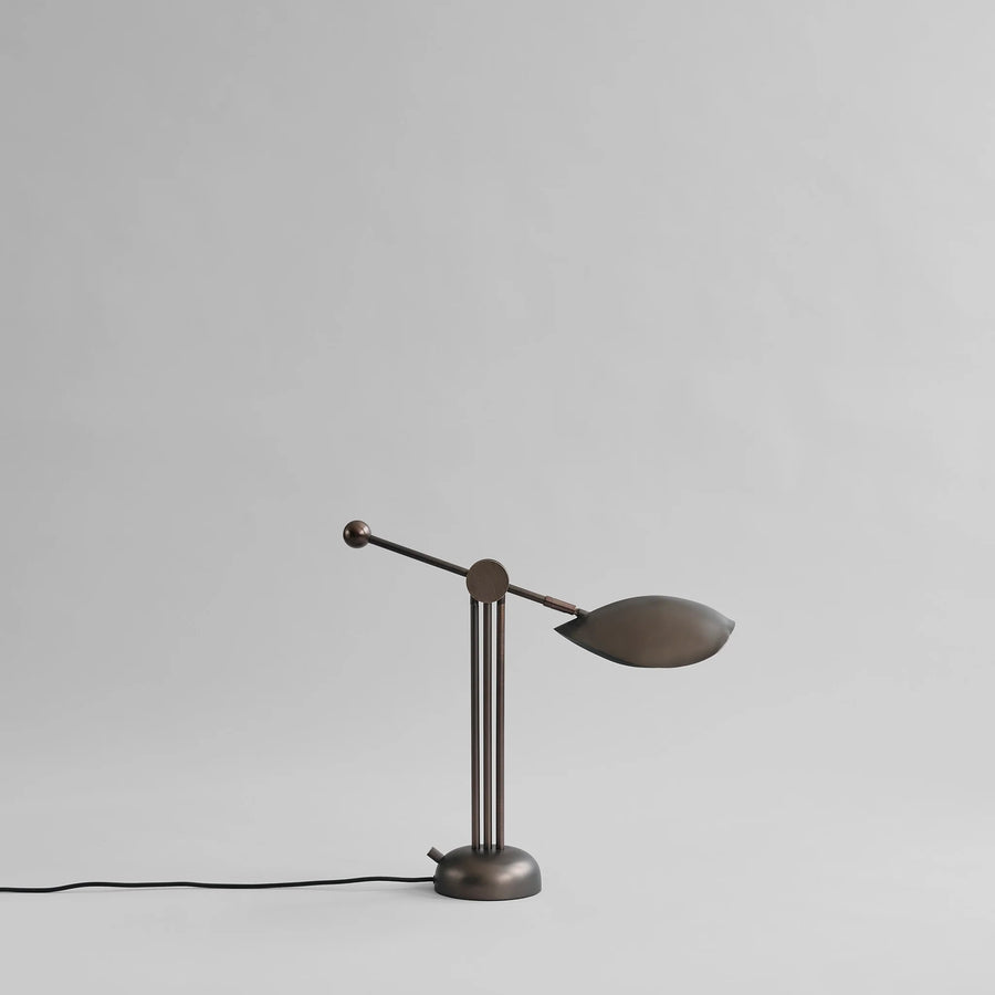 Vintage-style table lamp on a plain background