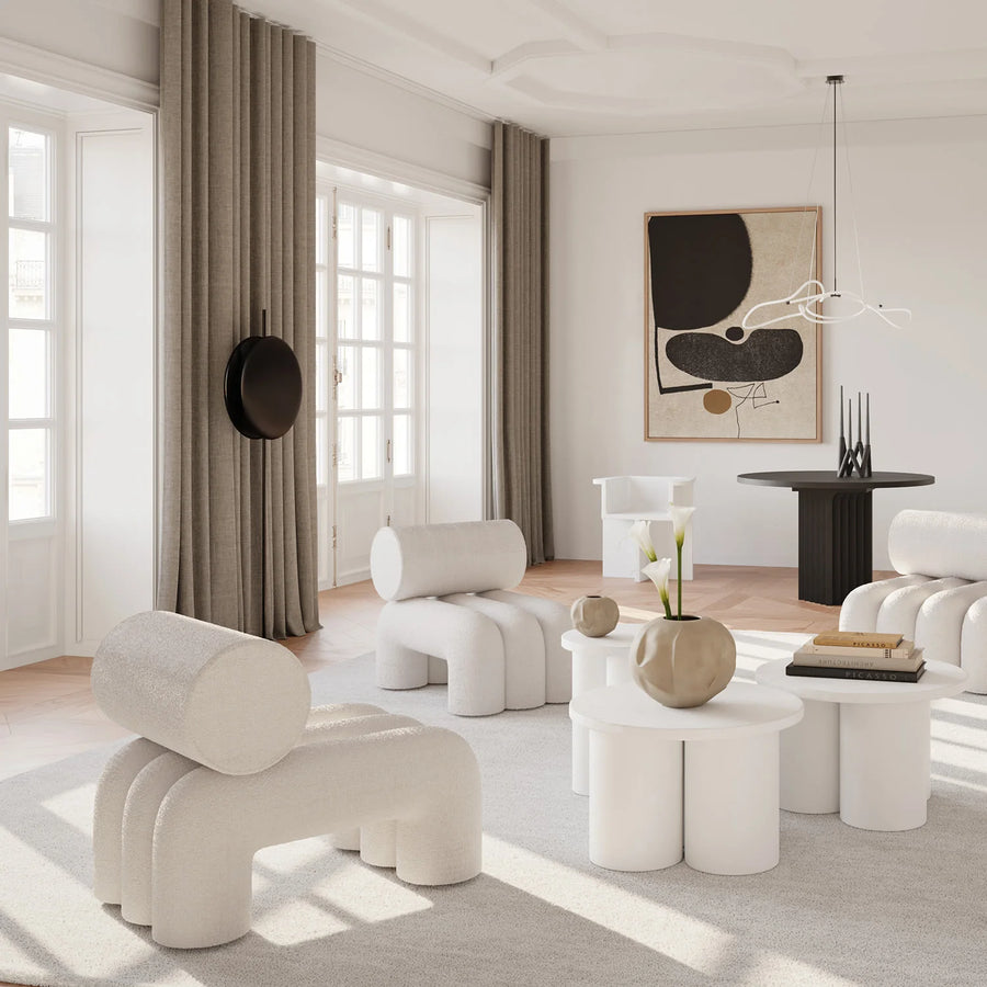 Modern living room with minimal white colour furniture and art objects. 