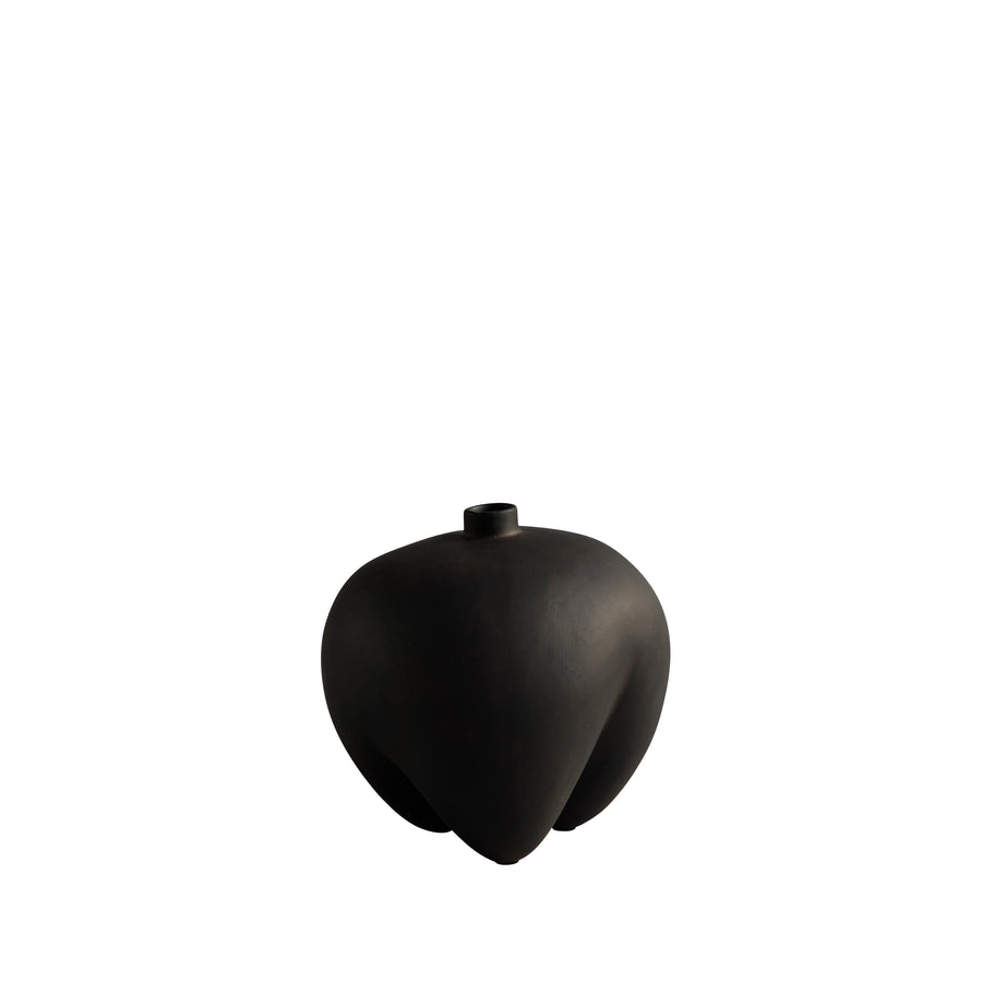 Black vase shaped like a stylized fruit on a white background from 101 Copenhagen at Spacio retail stores in Mumbai & Kolkata. 