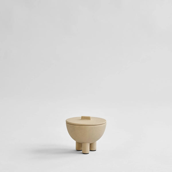 Beige ceramic bowl on a white background from 101 Copenhagen at Spacio retail stores in Mumbai & Kolkata. 