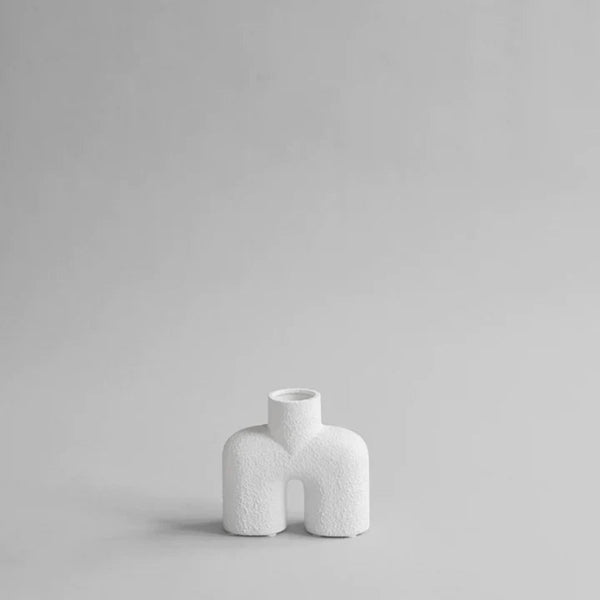 A small 101Cph Cobra Uno Mini Bubble White 203021 vase on a grey background.