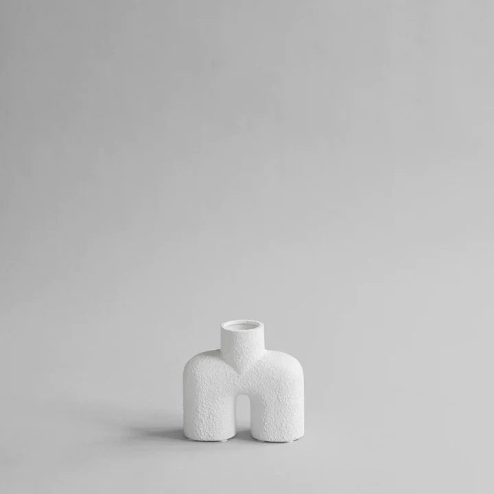 A small 101Cph Cobra Uno Mini Bubble White 203021 vase on a grey background.