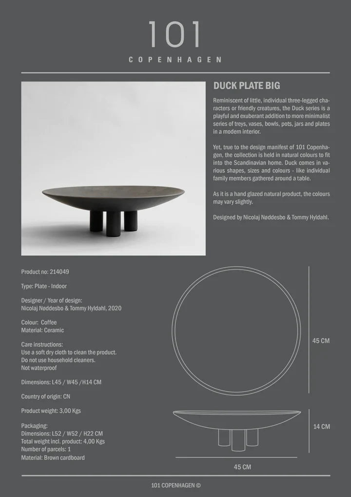 A 101 Copenhagen Duck Plate Big Coffee 214049-inspired black table with a unique design on it.