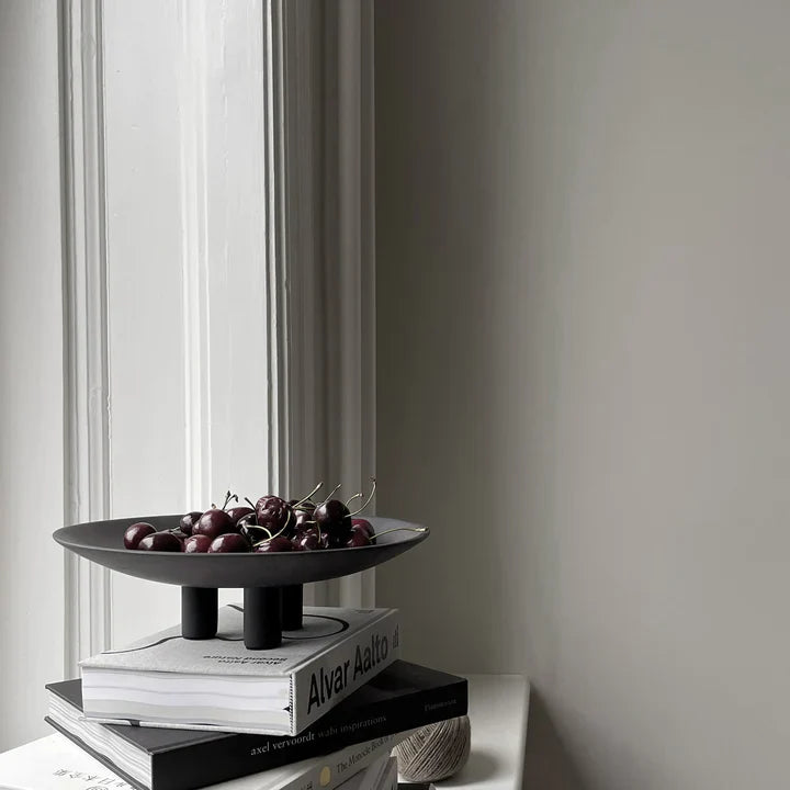 A 101 Copenhagen Duck Plate Mini Coffee 214048 sits on a shelf in a Scandinavian home.