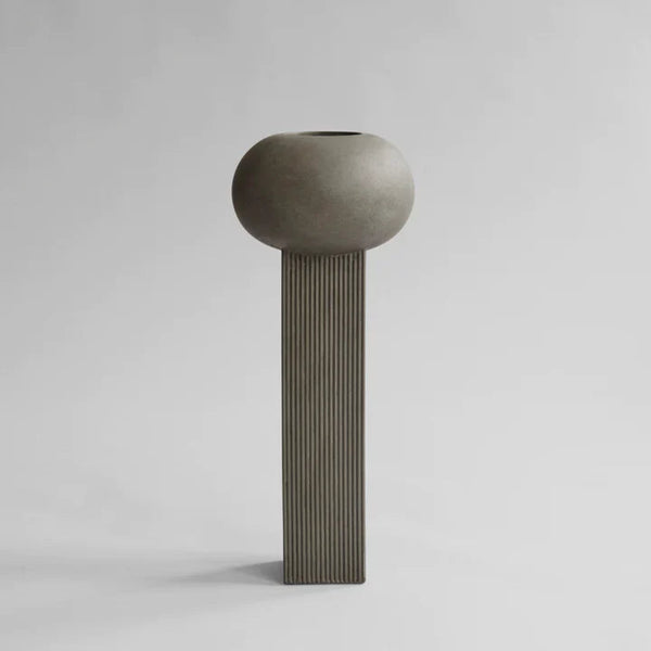 An 101Cph Empire Big Dark Grey 223034 concrete vase by 101 Copenhagen on a white background.