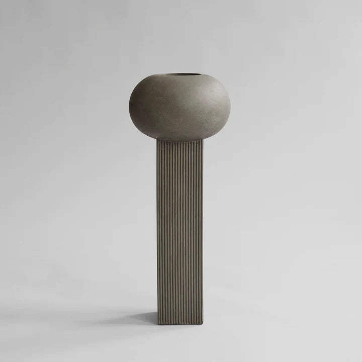 An 101Cph Empire Big Dark Grey 223034 concrete vase by 101 Copenhagen on a white background.