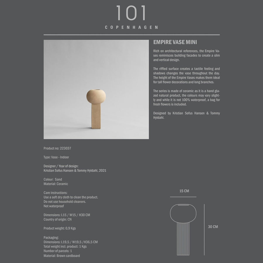 A quirky brochure featuring a picture of a table adorned with a small object, showcasing the 101Cph Empire Mini Sand 223037 vase from the Cobra Arts Movement.