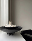 A 101Cph Medusa Tray Mini Coffee 221064 sits on a table next to a window.