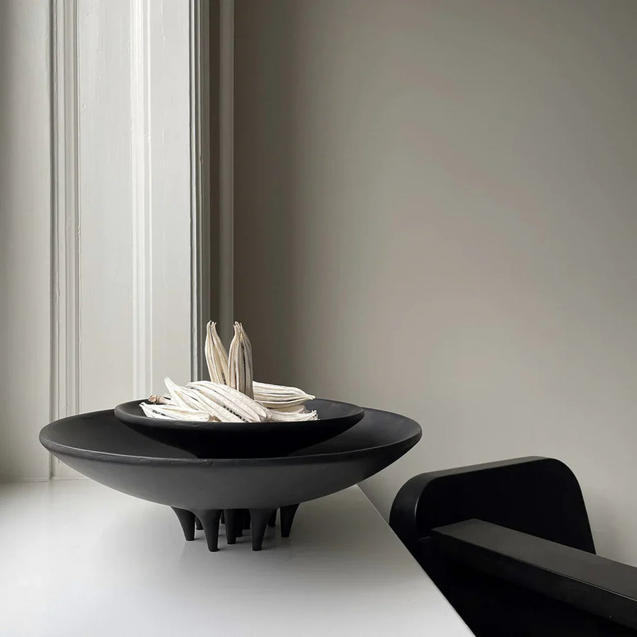 A 101Cph Medusa Tray Mini Coffee 221064 sits on a table next to a window.