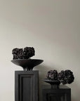 Three 101Cph Medusa Tray Mini Coffee 221064 vases on a coffee-coloured table next to a white wall.