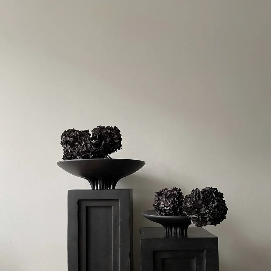 Three 101Cph Medusa Tray Mini Coffee 221064 vases on a coffee-coloured table next to a white wall.