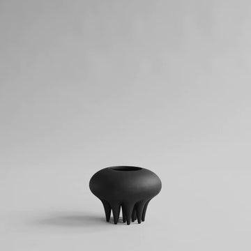 A 101Cph Medusa Vase Mini Coffee 221062 by 101 Copenhagen sitting on a white surface.