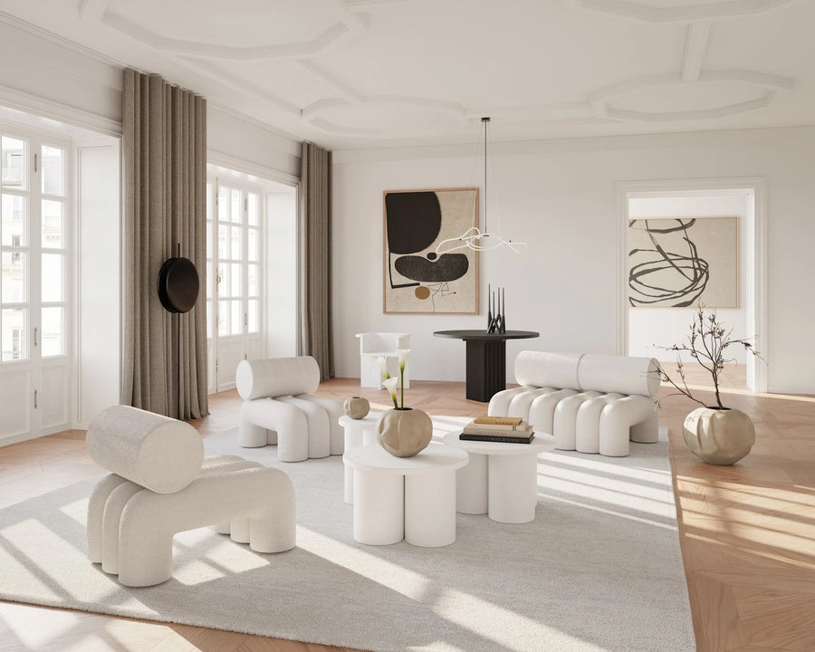 Modern living room with white furniture and neutral decor