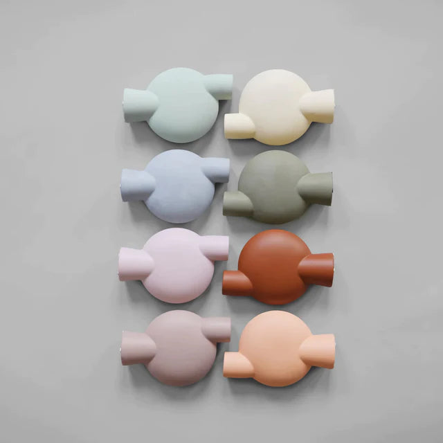 A limited edition collection of 101Cph Sphere Vase Bubl Medio Cinnamon 221035 (Limited Edition) circles arranged on a gray background by 101 Copenhagen.