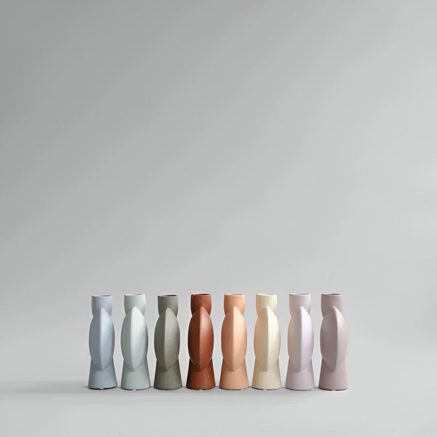 A group of 101 Copenhagen brand vases from the Limited Edition 101Cph Sphere collection on a grey background.
