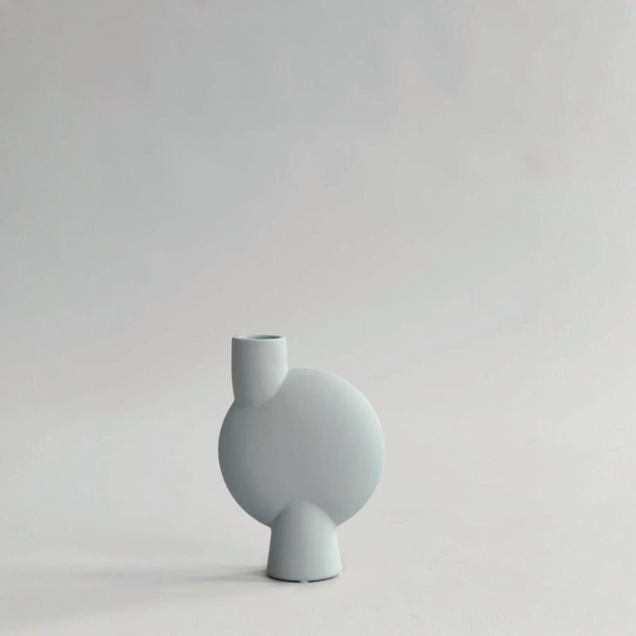 A small grey 101Cph Sphere Vase Bubl Medio Mint 221038 (Limited Edition) from the Sphere collection by the Scandinavian brand, 101 Copenhagen, on a white background.