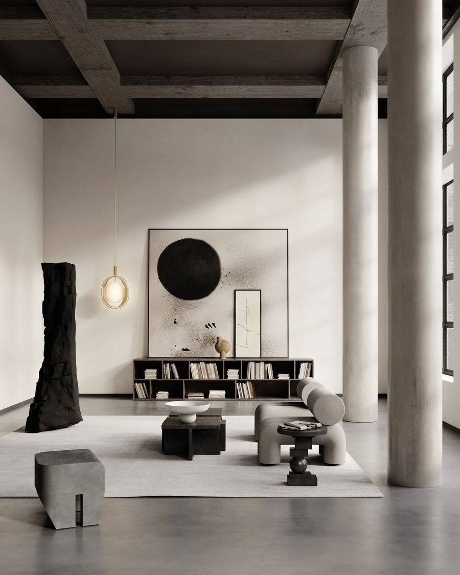 Modern living room with minimalistic decor and large columns.