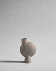 Ceramic sculptural vase on a gray background from 101 Copenhagen at Spacio retail stores in Mumbai & Kolkata. 