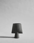 A Scandinavian brand's 101Cph Sphere Vase Square Mini Dark Grey 111020 from the 101 Copenhagen collection on a white background.