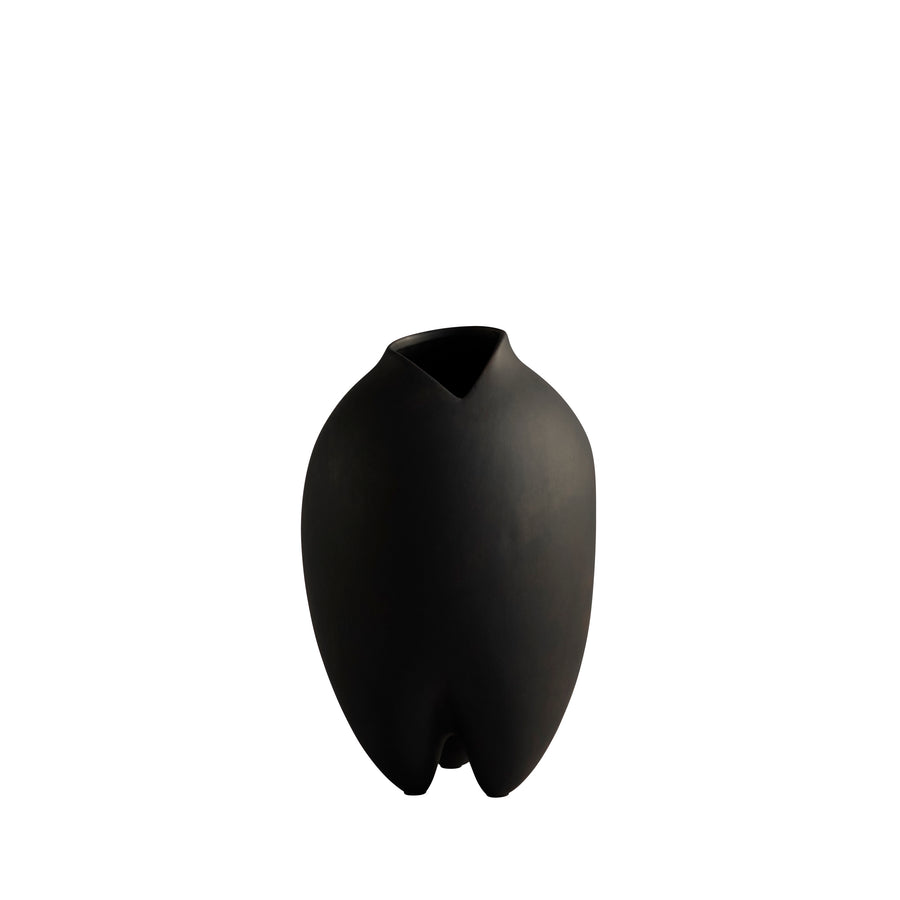 Black vase on a white background from 101 Copenhagen at Spacio retail stores in Mumbai & Kolkata. 
