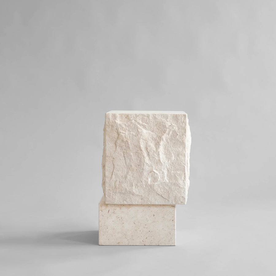 Tall limestone plinth from 101 Copenhagen at Spacio retail stores in Mumbai & Kolkata. 