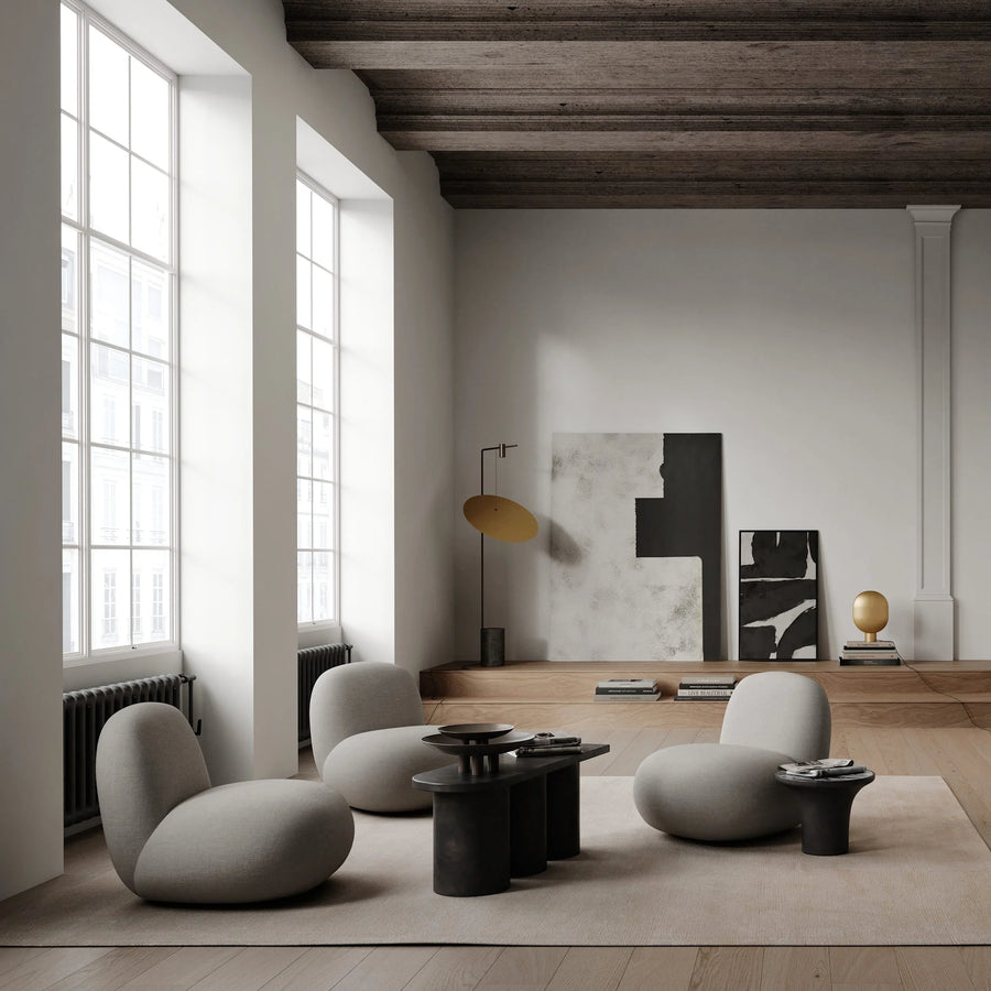 Modern living room with minimalistic furniture and decor.