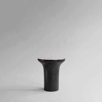 Calacatta marble top tall side table from 101 Copenhagen at Spacio retail stores in Mumbai & Kolkata. 