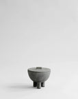 Concrete bowl with lid on a light gray background from 101 Copenhagen at Spacio retail stores in Mumbai & Kolkata. 