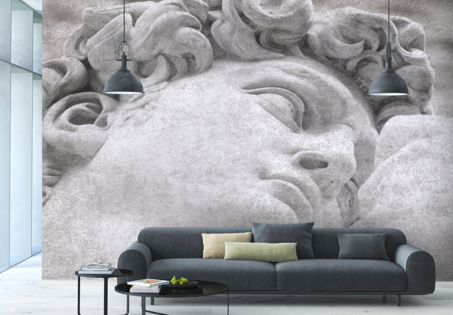 Close-up fresco mural of Michelangelo’s David, crafted with Italian plaster using Carrara marble and travertine powder, showcasing intricate classical details. Featured on a double height wall of a living room