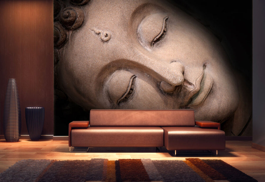 Close-up fresco mural of a Sleeping Buddha's face, crafted with Italian plaster using Carrara marble and travertine powder, showcasing intricate, serene details. Featured on a wall of double height in a luxury modern living room