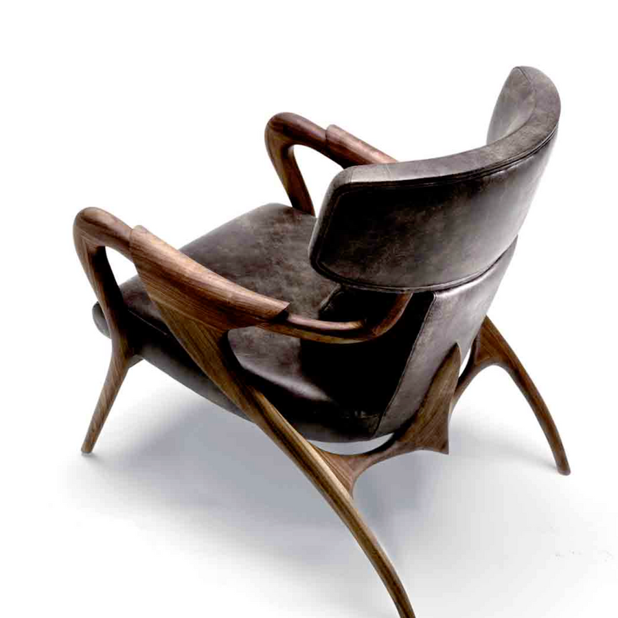 Agrippa Isadora, a modern lounge chair with a wooden frame, combining Nordic design elements.