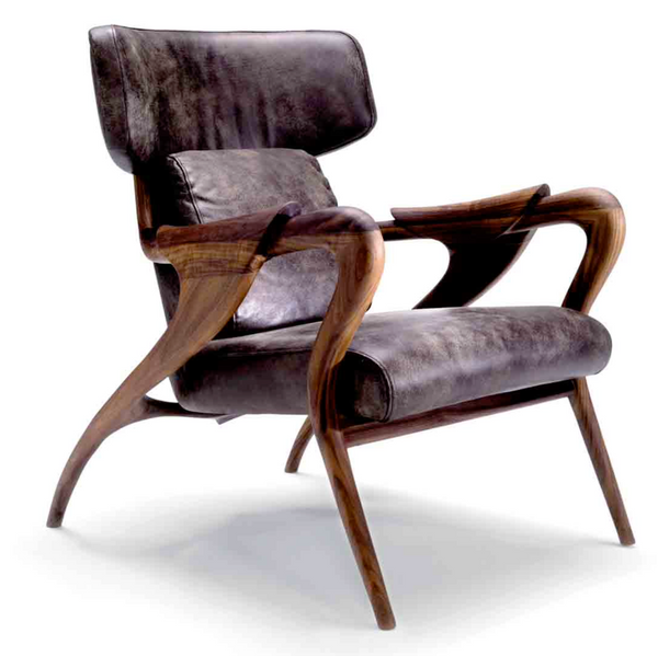 The Agrippa Isadora Lounge Chair blends Nordic design influences with modern style, featuring a wooden frame and luxurious leather upholstery.