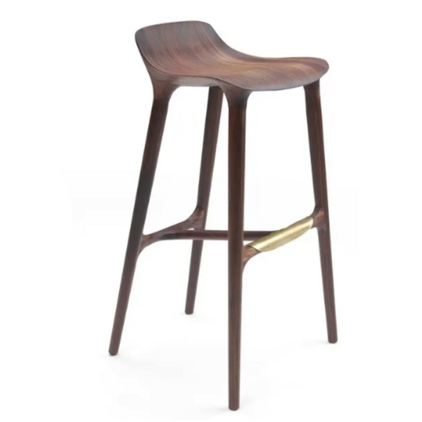 The Agrippa Morgan Bar Stool combines European luxury with Agrippa Spain's expertise, featuring a wooden seat and elegant brass legs.